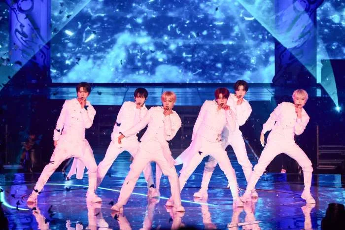 K-pop group NCT Wish showcasing a simple and relatable youthful concept on stage